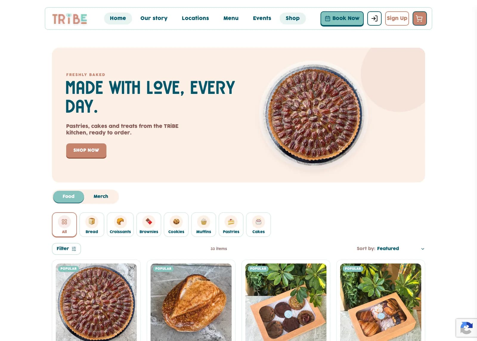 Screenshot of the TRiBE online shop, listing pastries, cakes and merch